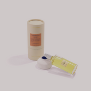 Flacon rechargeable du parfum naturel L'Ambre des Fleurs (ouvert) et sa boîte cylindrique 